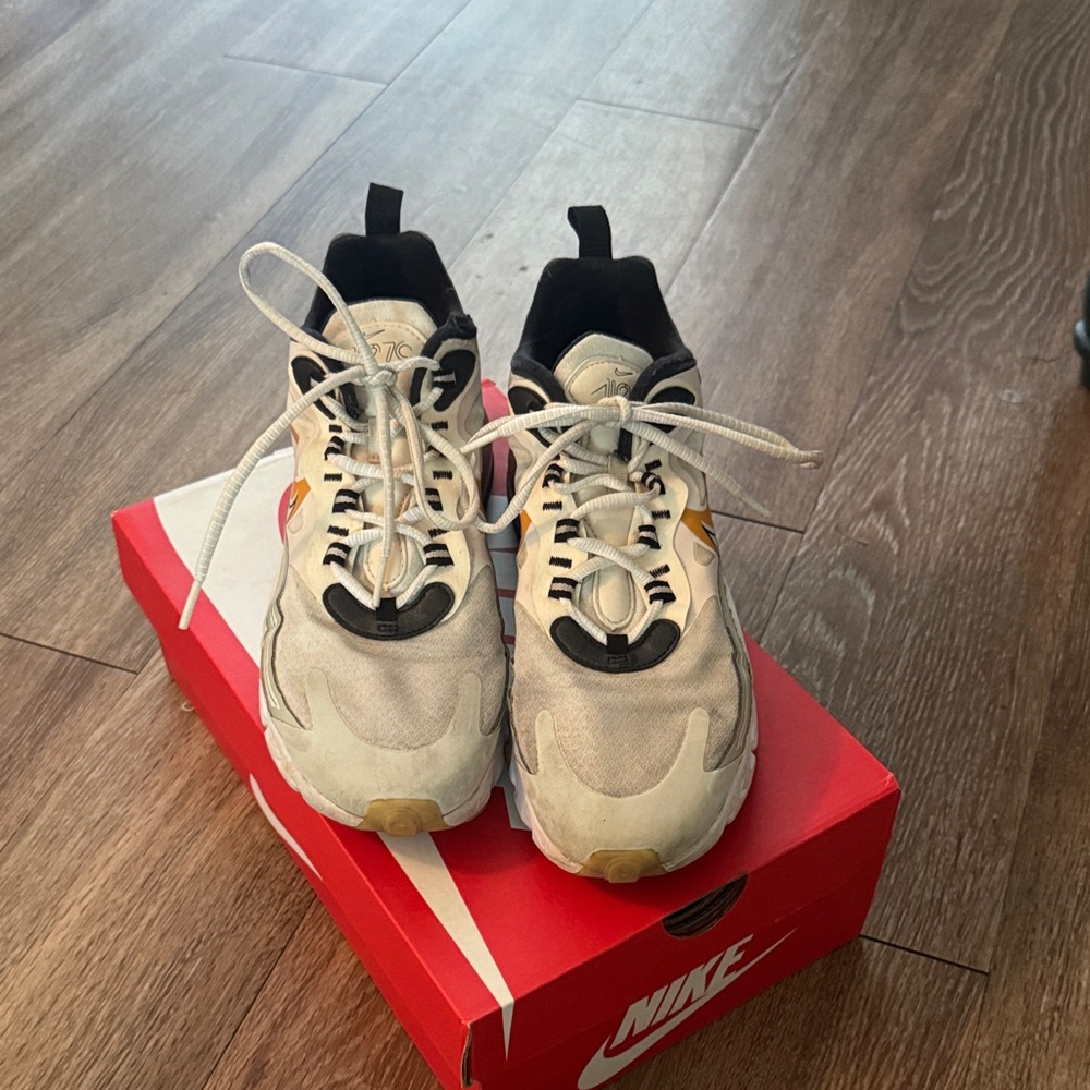 Nike Air Max 270 React in Cream and Black with Orange Swoosh shoes